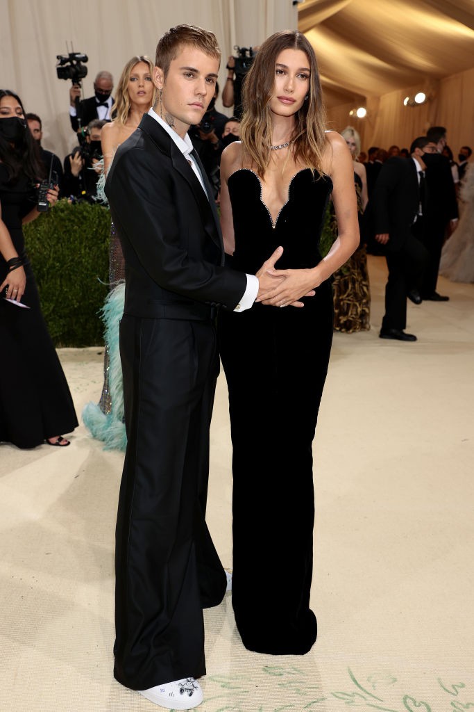 Justin places hands on Hailey Baldwin's tummy, sparking pregnancy rumors.