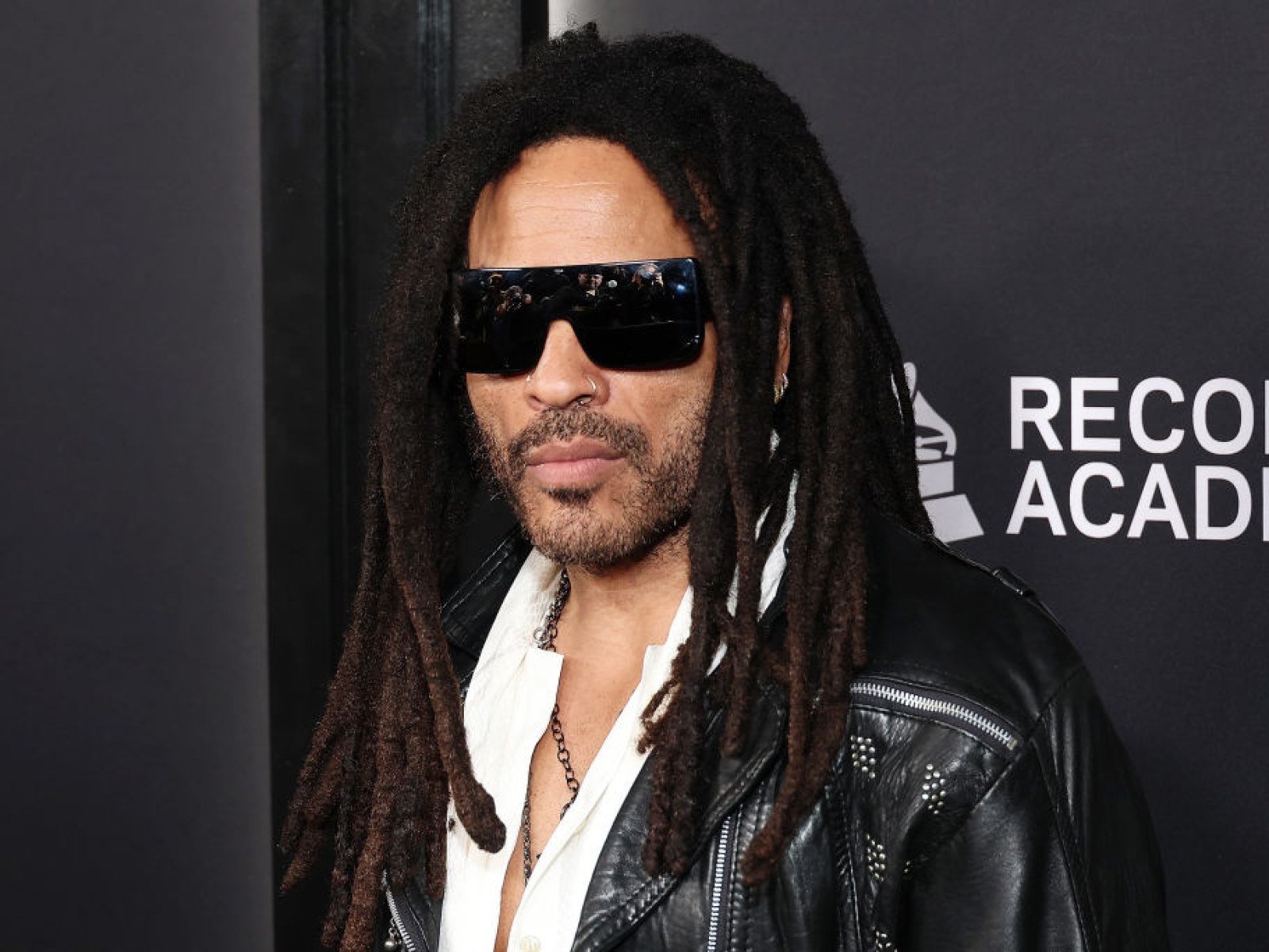 does lenny kravitz smoke cigarettes SPAIN OUT Zoe Kravitz bundles up in
