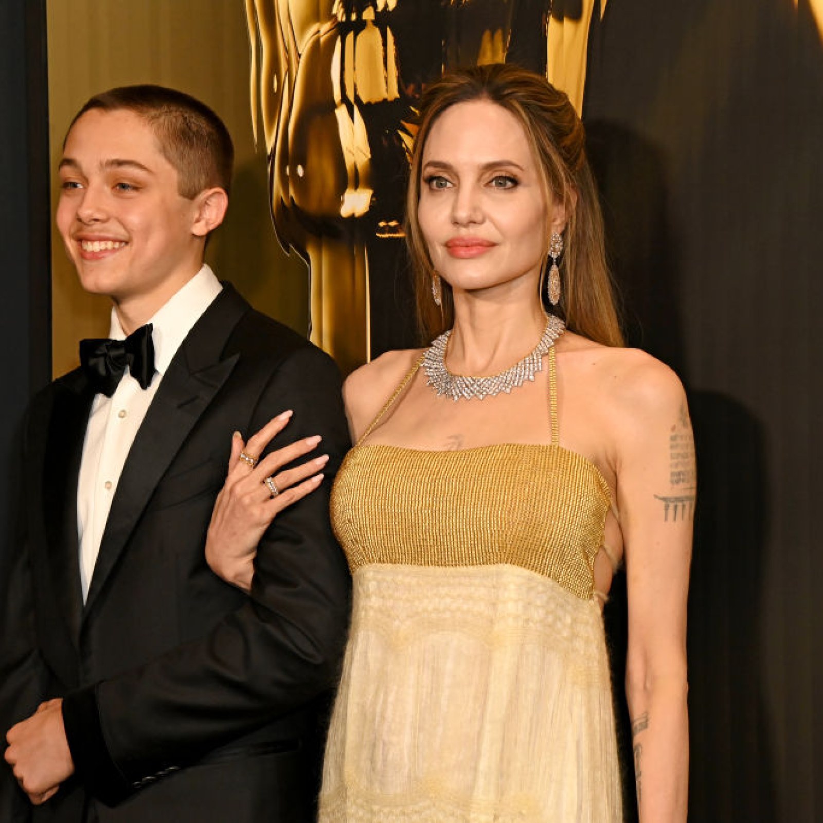 Brad Pitt's Suspicion Grows as Angelina Jolie Walks Red Carpet with Their Son Knox Amid Divorce Drama: Report