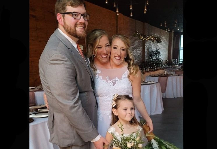 Conjoined Twins Abby and Brittany Hensel Seen With Baby in