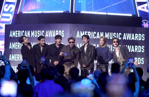 BTS speak onstage during the 52nd American Music Awards