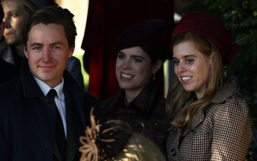 Princess Eugenie of York (C) and Princess Beatrice of York